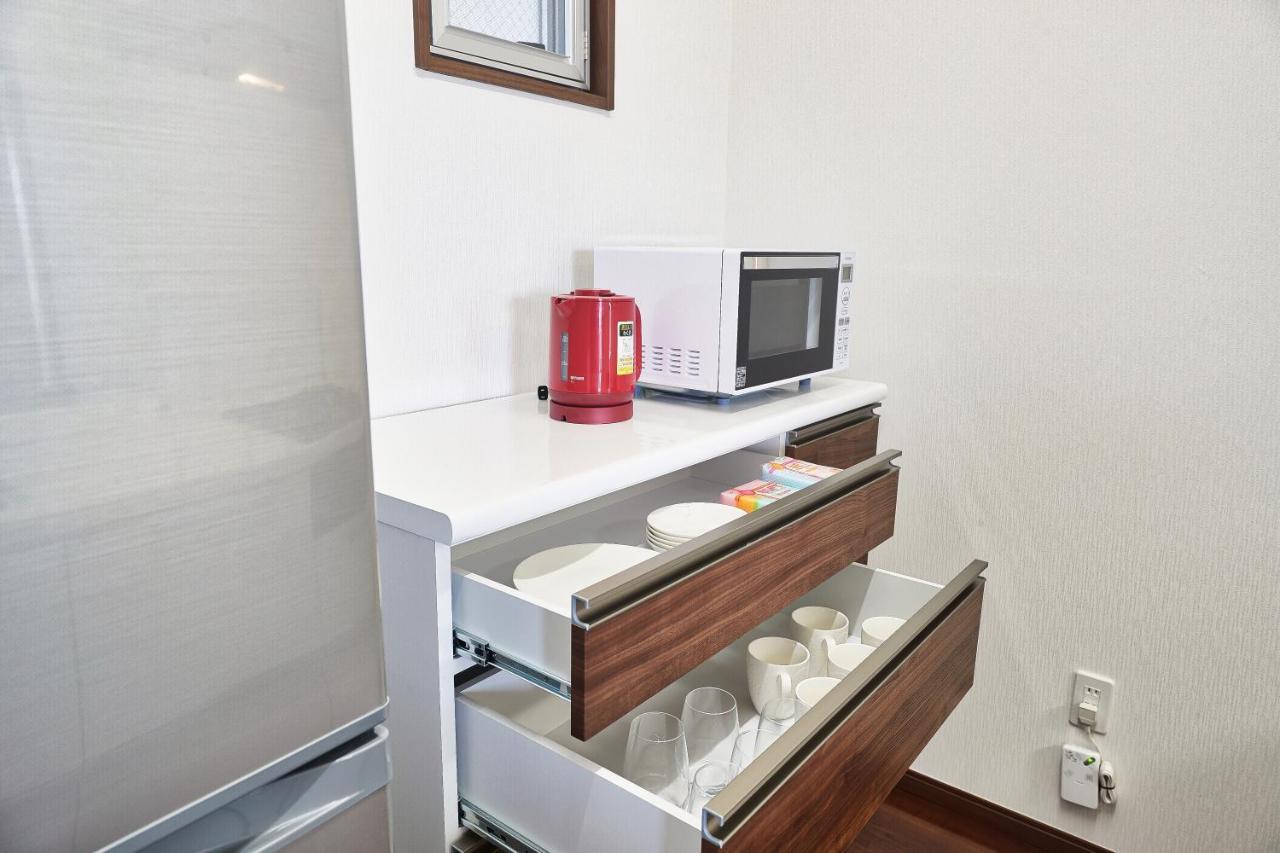 Freedomhillsフリーダムヒルズa棟 Apartment Tomigusuku ภายนอก รูปภาพ